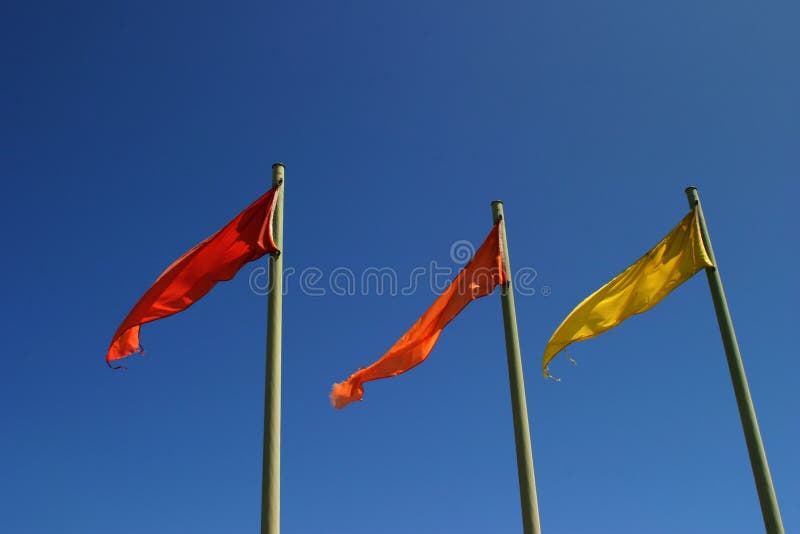 217 Red Orange Yellow Flags Waving Stock Photos Free & RoyaltyFree