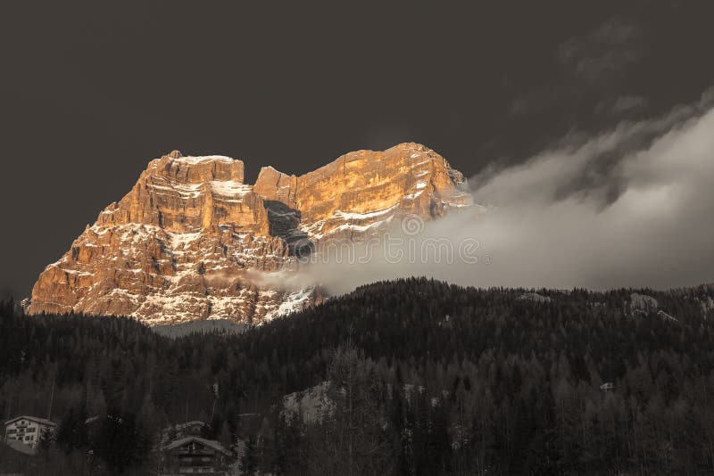 Color isolation effect of Mount Pelmo with snow at sunset