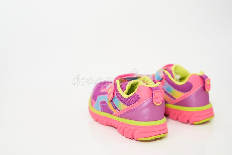 Color Kid Sneakers Shoes on Floor Rear View Soft Focus Stock Image ...