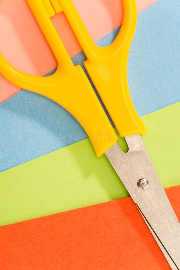 Color papers with scissors paperwork art royalty free stock photography