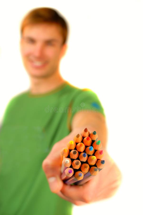 Color pencils in hand