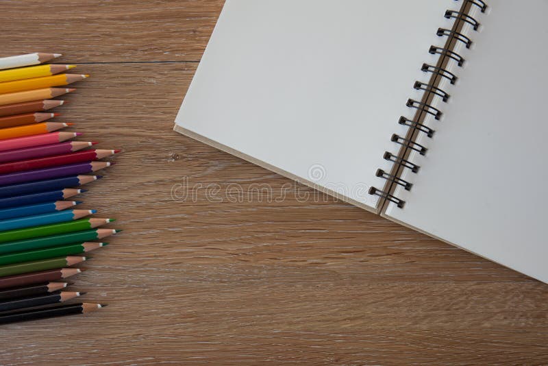 Color pencils with notebook