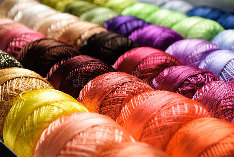 Color threads. Different color threads on rows in the store stock image