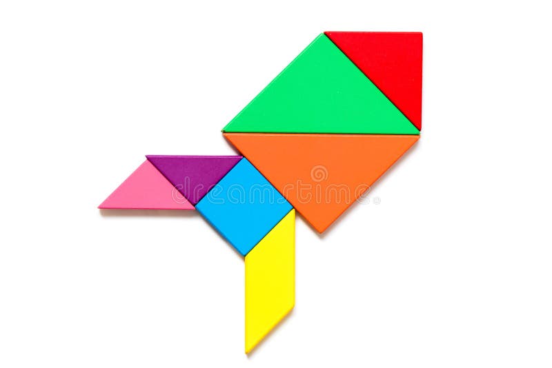 Color wood tangram in rocket or missile shape on white background royalty free stock photo
