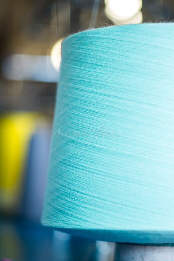 Color yarn cone closeup stock image. Image of industry 47380983