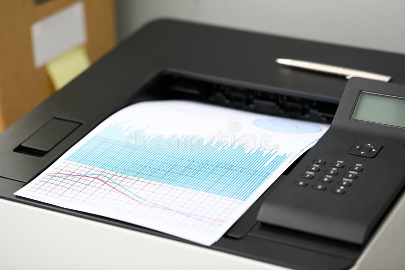 Close-up on special high-tech fax printing significant charts and graphs in office. Pile of documents used to analyze successful corporation investment. Reports sale concept. Close-up on special high-tech fax printing significant charts and graphs in office. Pile of documents used to analyze successful corporation investment. Reports sale concept