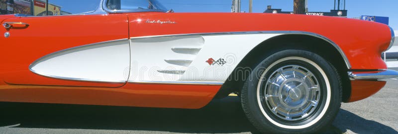 Restored red 1959 Corvette, fender close-up, Portland, Oregon. Restored red 1959 Corvette, fender close-up, Portland, Oregon