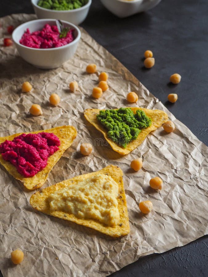 Colored Chickpeas Puree and Nachos Chips. Stock Image Image of corn