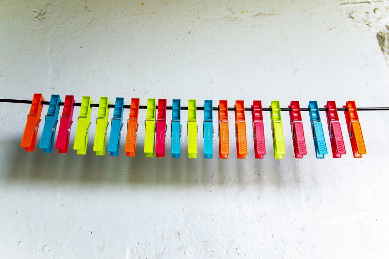 Colored Clothespins on a White Background Stock Image - Image of bright