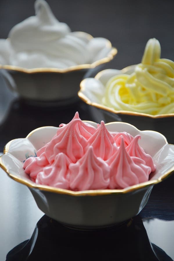 Colored creamy desserts in kremanki royalty free stock images Colored creamy desserts in kremanki royalty free stock images