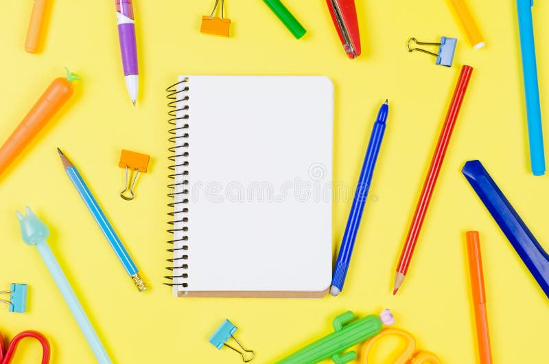 Colored different school supplies on soft yellow paper background. Notebook, pens, pencils and other tools. Back to school background. Flat lay, top view, copy space. Banner for site. Colored different school supplies on soft yellow paper background. Notebook, pens, pencils and other tools. Back to school background. Flat lay, top view, copy space. Banner for site