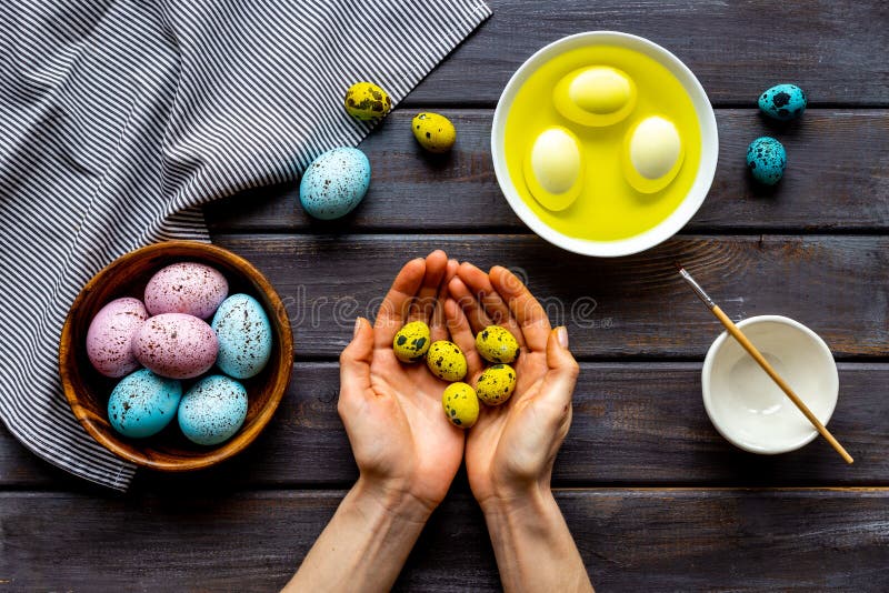 Colored Easter eggs with yellow dye. Top view