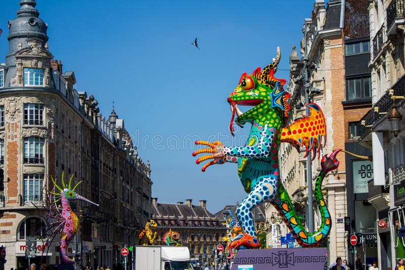 Colored statue on the streets of Lille, France
Lille is the capital of the Hauts-de-France region in northern France, near the border with Belgium. A cultural hub and bustling university city today, it was once an important merchant center of French Flanders, and many Flemish influences remain. The historic center, Vieux Lille, is characterized by 17th-century brick town houses, cobbled pedestrian streets and the large central square, Grand Place. Colored statue on the streets of Lille, France
Lille is the capital of the Hauts-de-France region in northern France, near the border with Belgium. A cultural hub and bustling university city today, it was once an important merchant center of French Flanders, and many Flemish influences remain. The historic center, Vieux Lille, is characterized by 17th-century brick town houses, cobbled pedestrian streets and the large central square, Grand Place.