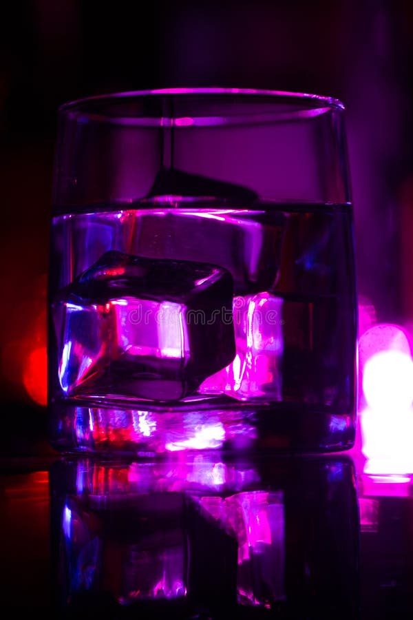 Colored Lighting of Glasses in the Night Club Bar Stock Photo Image