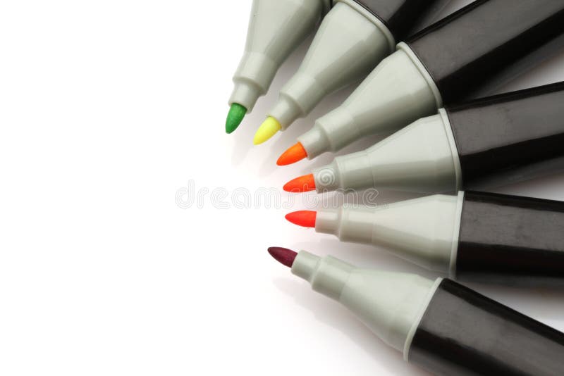 Colored markers on white background royalty free stock images