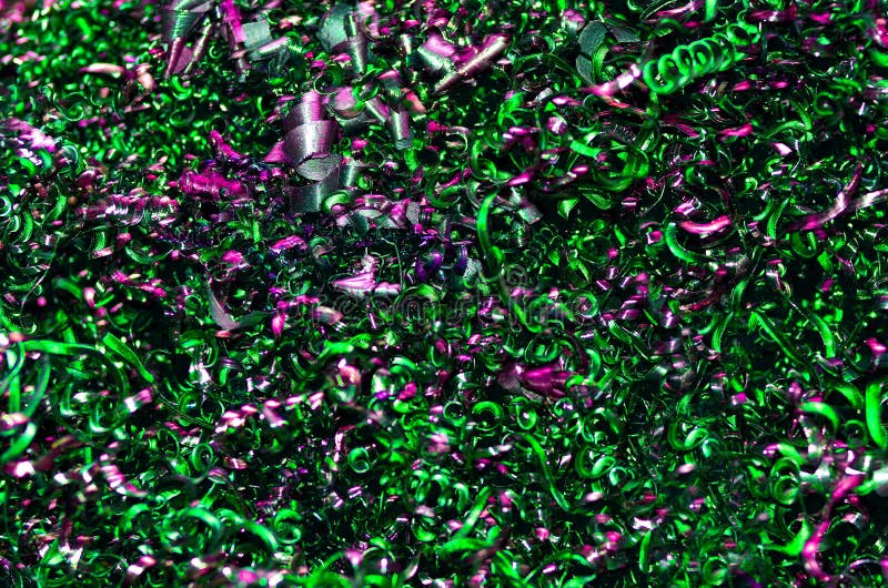 Colored metal twisted spiral in the form of chips obtained as a result of processing metal products on a turning industrial CNC royalty free stock photography Colored metal twisted spiral in the form of chips obtained as a result of processing metal products on a turning industrial CNC royalty free stock photography