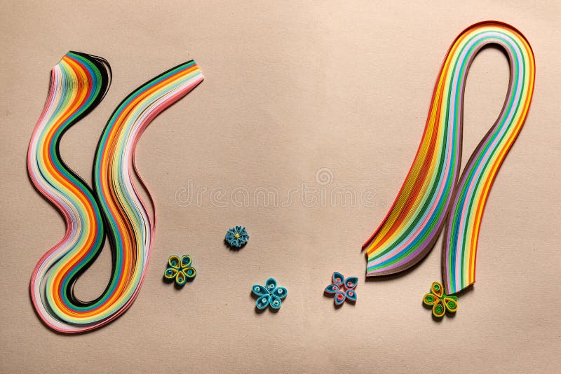 Quilling Paper Flowers and an Artificial Tulip Against the Background