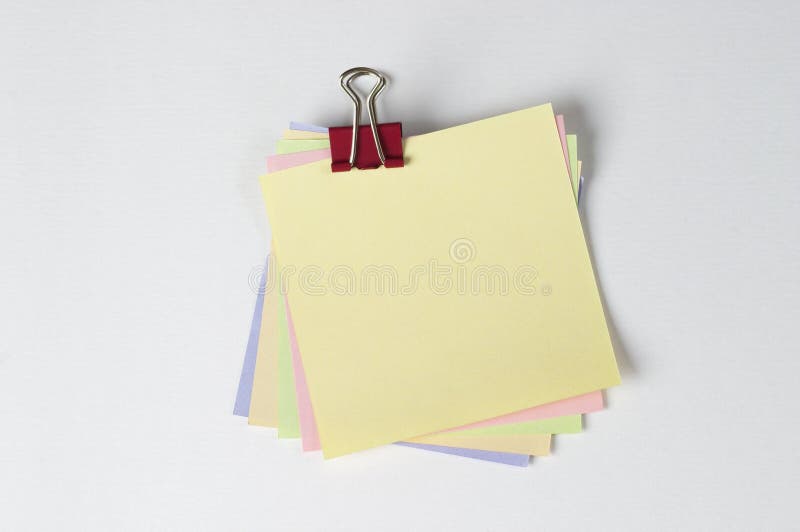 Colored notes with paper clip royalty free stock photos