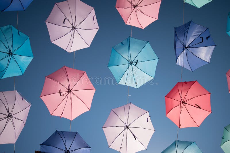 Colored Open Umbrellas on Sky Background. Stock Photo Image of vivid