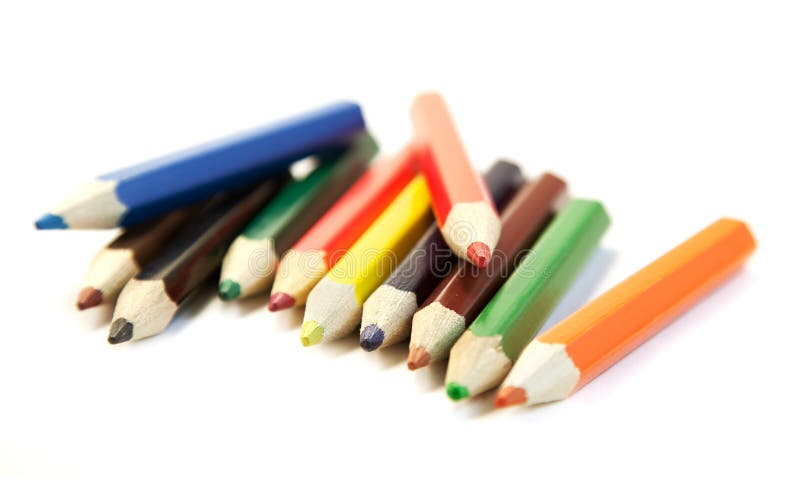 Colorful Crayons, Colored Pencils, Markers, Pens And Scissors In A Green  Box On A Desk Stock Photo, Picture and Royalty Free Image. Image 5247060.