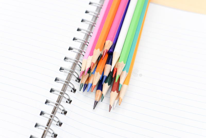 Colored Pencils on Journal stock photo. Image of high 19916846