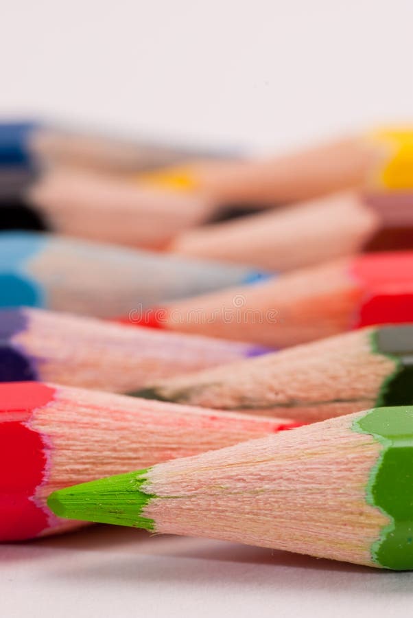 Colored Pencils Lined Up stock photo. Image of literature 14956286