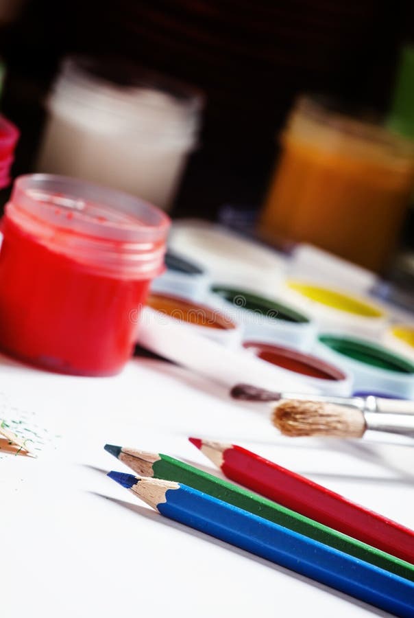 Colored Pencils and Paints Drawing Tools, Selective Focus Stock Photo Image of paintings