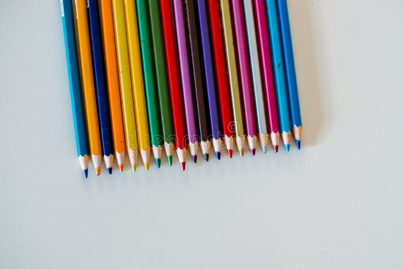 Colored pencils on white stock image. Image of draw 178395887