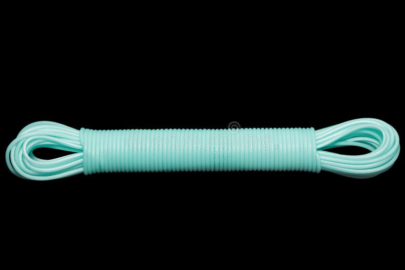 Colored plastic cord insulated on a black background. twisted cable stock image