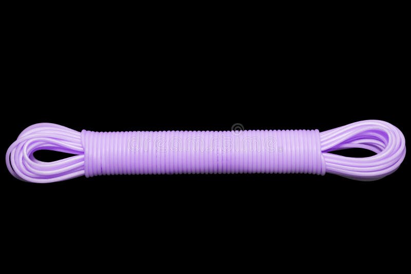 Colored plastic cord insulated on a black background. twisted cable stock images