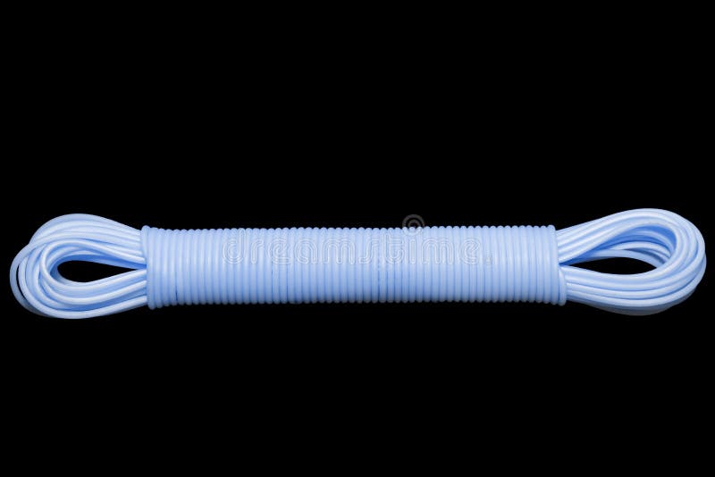 Colored plastic cord insulated on a black background. twisted cable stock photography
