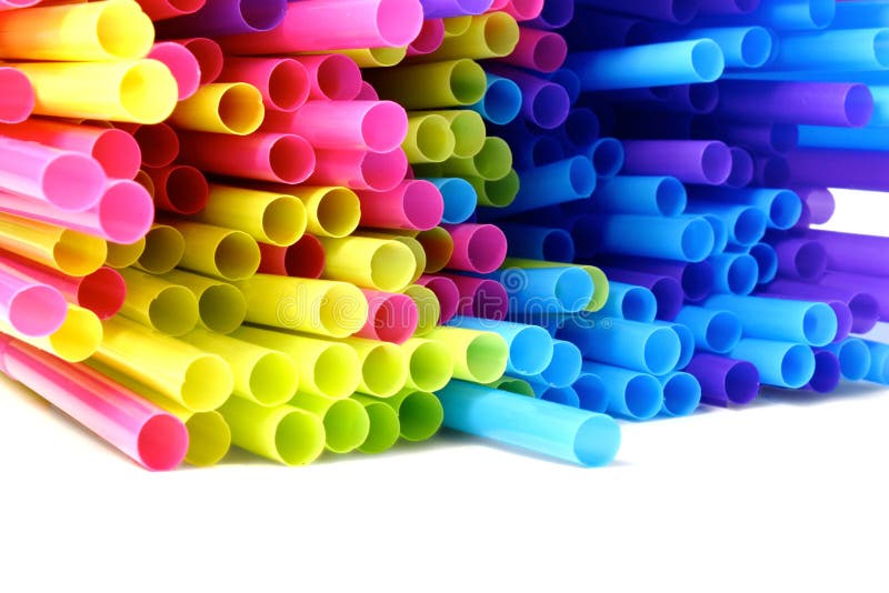 Colored plastic drinking straws on white background