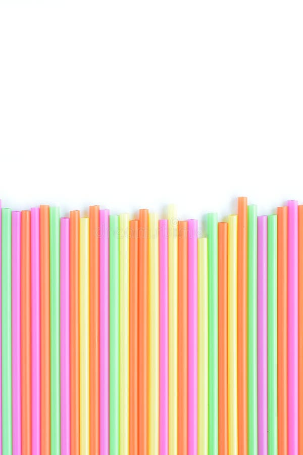 Colored plastic drinking straws on a white background