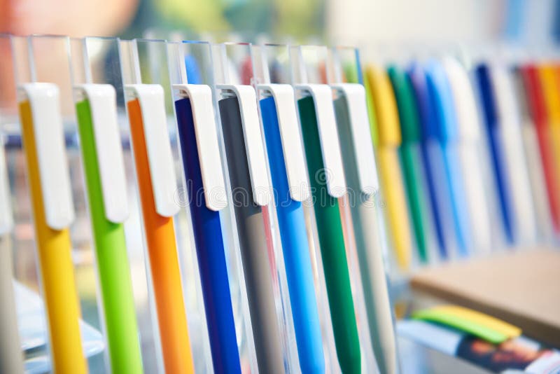 Colored plastic pens on store display