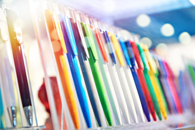 Colored plastic pens on store display stock photo