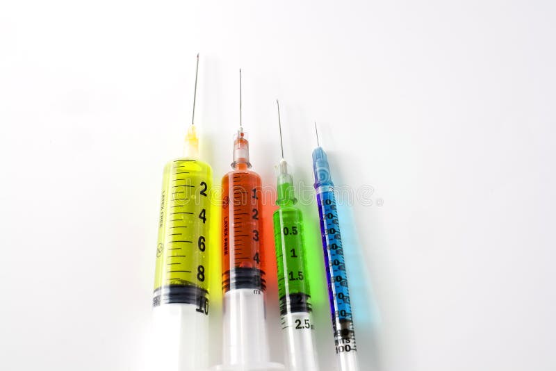 Set Of Syringes Filled With Yellow Liquid Isolated Stock Image Image