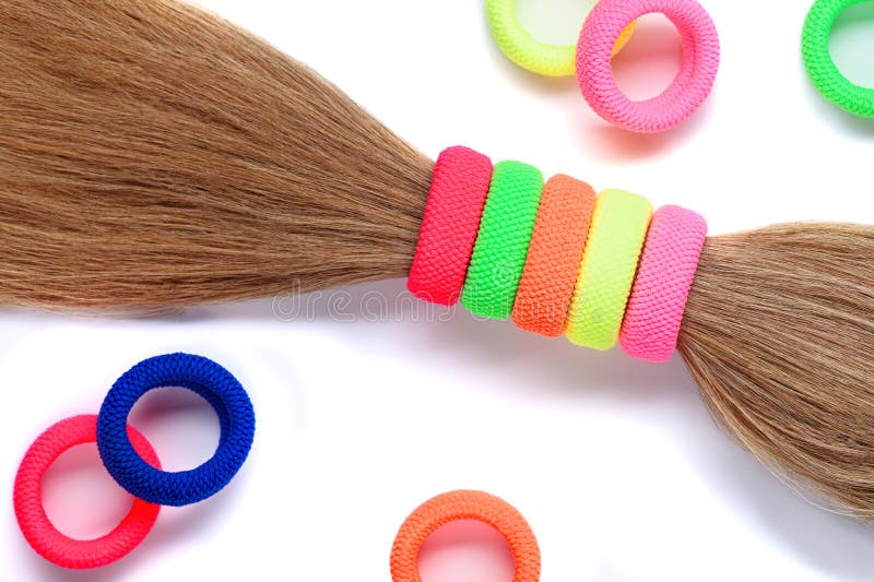 Colored Thin Elastic Bands Worn on the Hair on a White Isolated Background Stock Photo Image