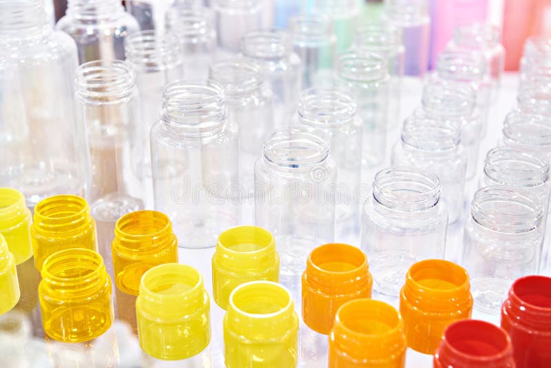 Colored and transparent plastic bottles royalty free stock photo