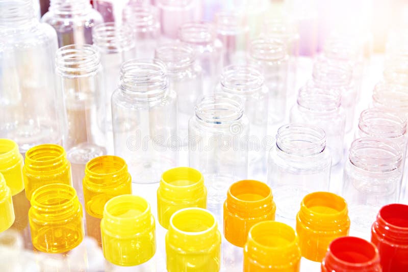 Colored and transparent plastic bottles royalty free stock images