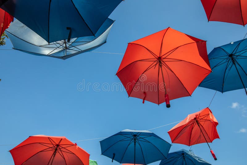 Colored Umbrellas on the Blue Sky Background Stock Photo Image of