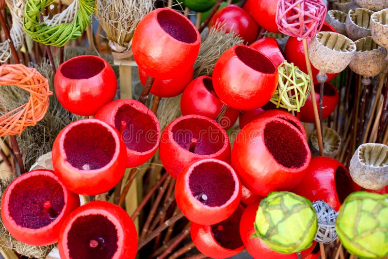 Colored wickerwork and colored poppy pods