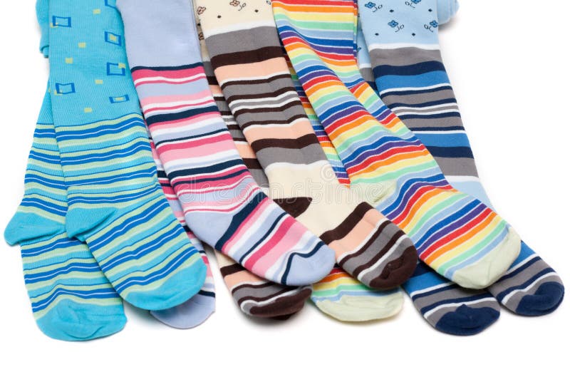 Medias de bebé a rayas de colores fotografía de archivo libre de regalías