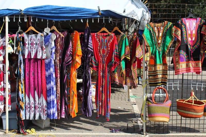 Colorful African fashions at an outdoor flea market