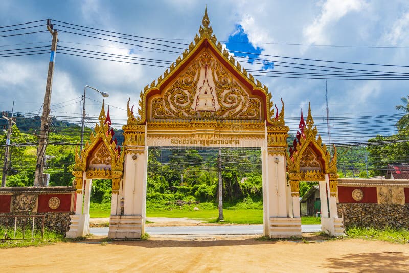 Colorful architecture of entrance gate Wat Ratchathammaram temple Thailand