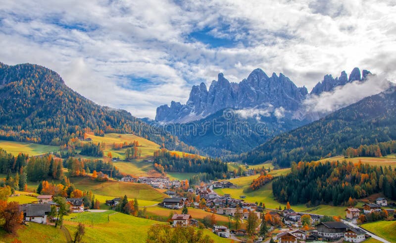 Colorful autumn scenery in Santa Maddalena village at sunny day. Dolomite Alps, South Tyrol, Italy royalty free stock photography Colorful autumn scenery in Santa Maddalena village at sunny day. Dolomite Alps, South Tyrol, Italy royalty free stock photography