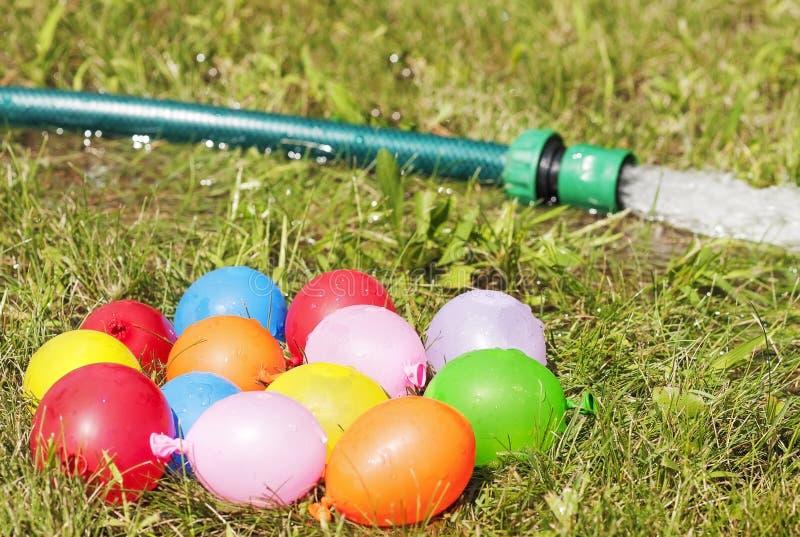 Balloons on a grass stock photo. Image of congratulations 2391558