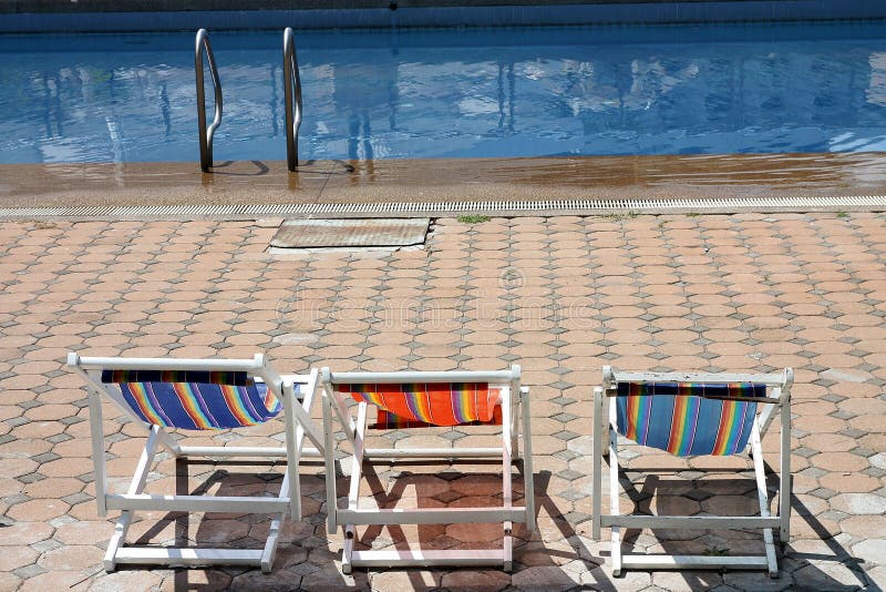 Colorful beach chair at swimming pool