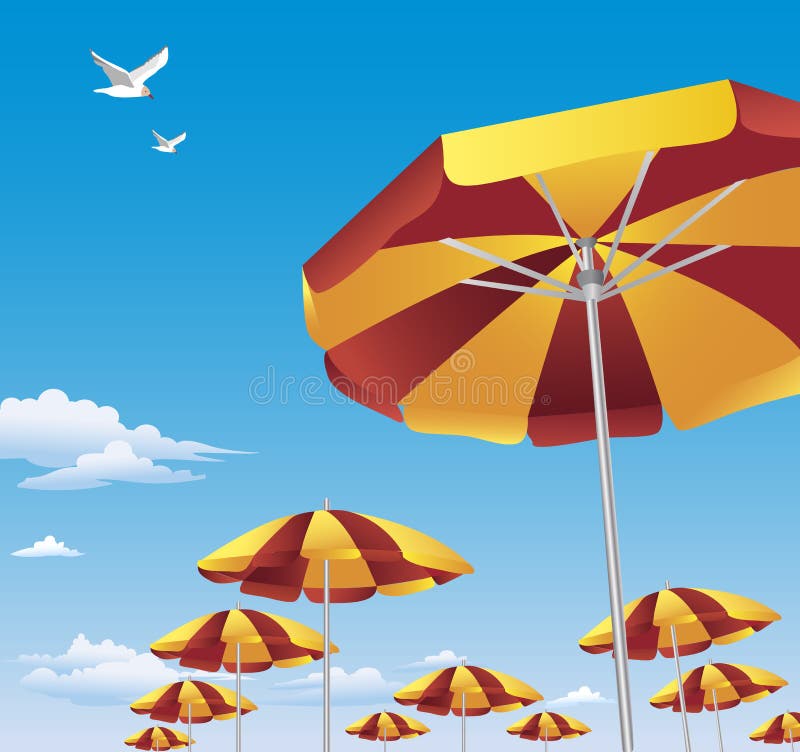 Colorful beach umbrellas against blue sky