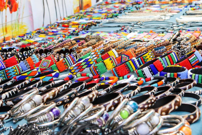 Colorful beads and leather handmade bracelets, bangles and necklaces at local craft market in South Africa.