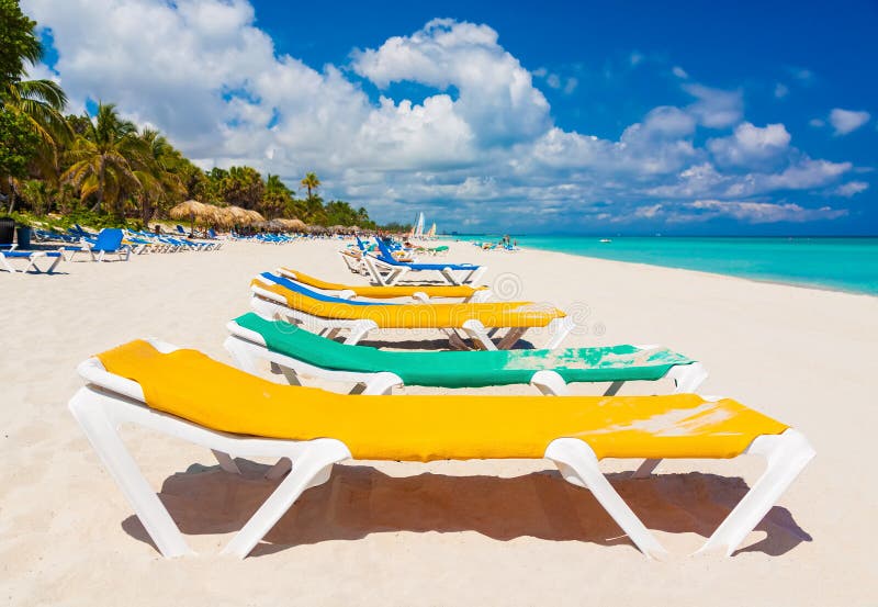 Colorful beds at a tropical beach in Cuba